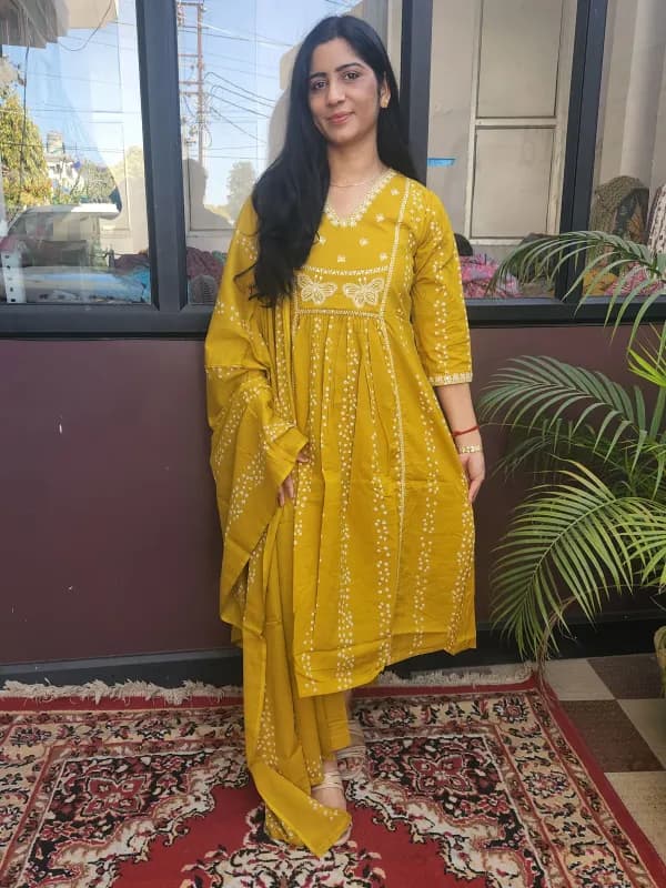 Radiant Yellow A-line Kurti Set with White Embroidery in Pure Cotton