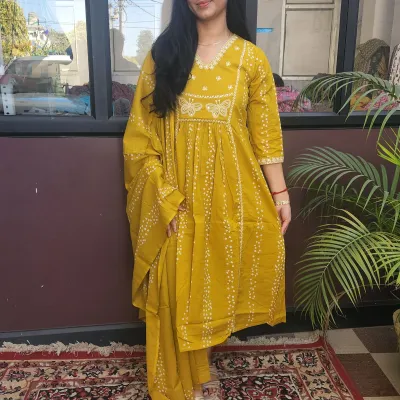 Radiant Yellow A-line Kurti Set with White Embroidery in Pure Cotton